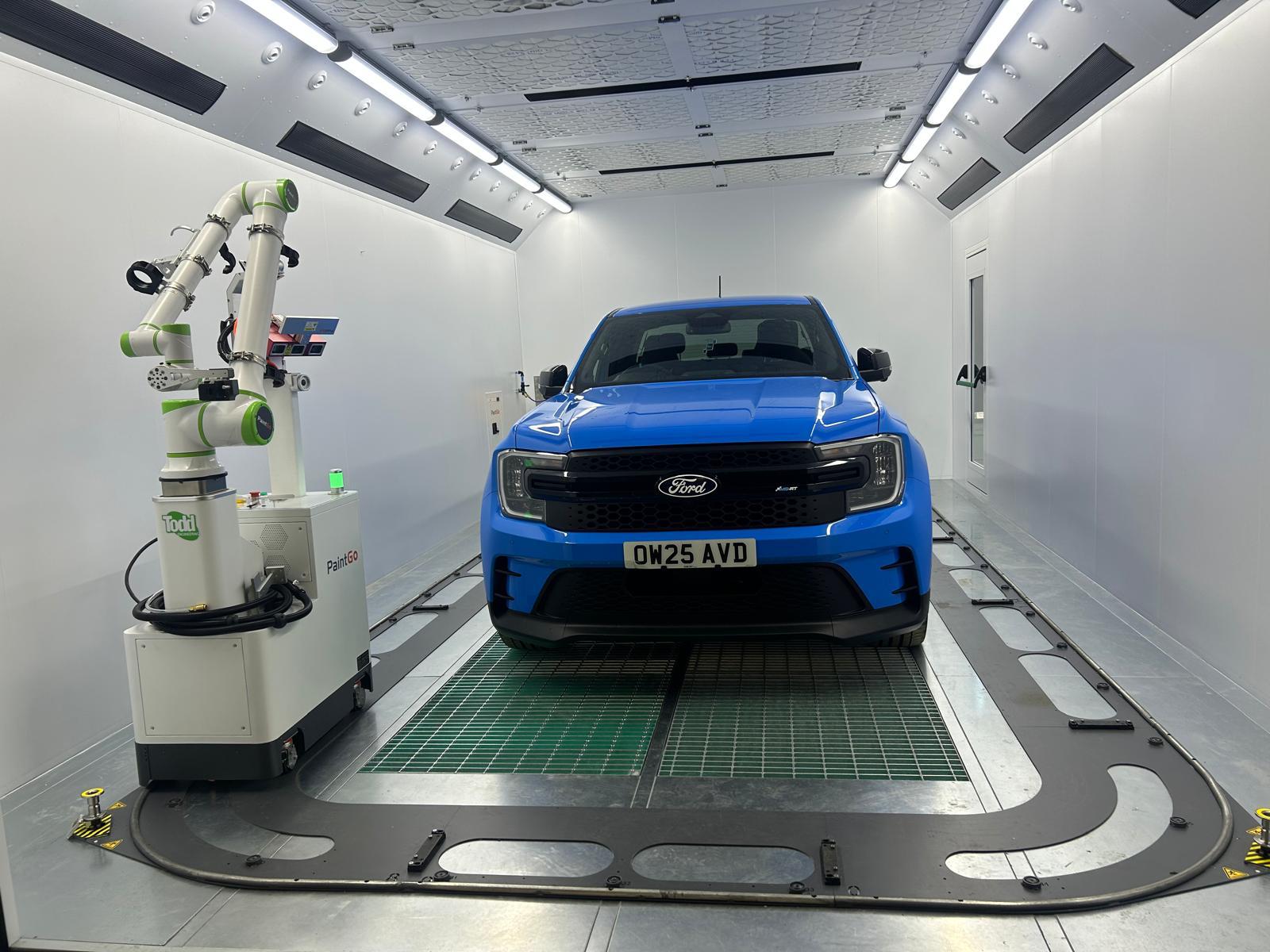 PaintGo robot and Ford Ranger inside Zeus XR booth